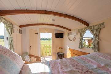 Complete with a comfy double bed and outlook over the meadow and fields beyond.