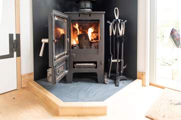 The warming wood-burner keeps the hut toasty in the cooler months.