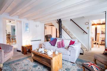 The sitting-room is open through to the dining-room.