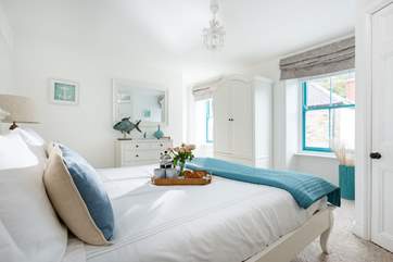 The master bedroom is lovely and light.