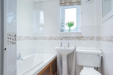 The family bathroom on the ground floor, perfect for washing off sandy feet.
