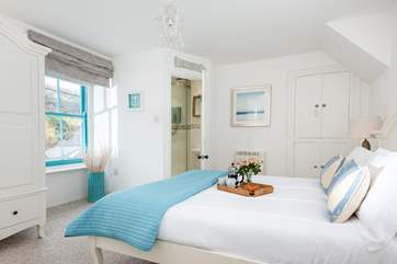 The master bedroom has an en suite shower-room.