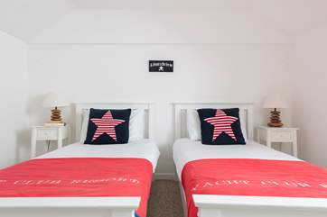The twin bedroom on the top floor is tucked away for peace and quiet.