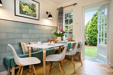 Enjoy breakfast in the large kitchen with the door thrown open to the private garden.