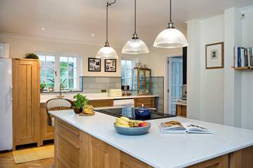 The open plan kitchen is very sociable.