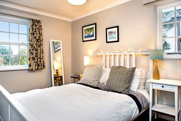 Enjoy lying in bed listening to the bird song (Bedroom 4).