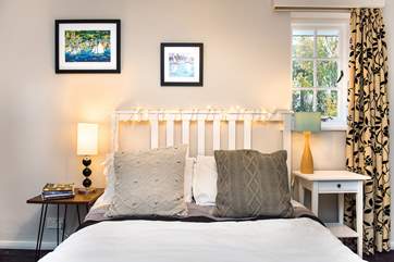 Enjoy slipping into bed under crisp white linens.
