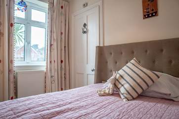 First floor single bedroom with double bed.