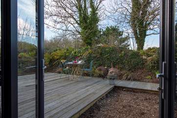French doors lead from the living-room out to your very own enclosed patio/garden area.