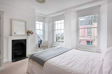 Lie in bed and look out to sea.