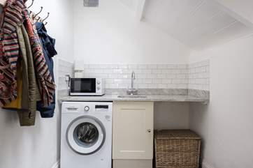 The utility-room is the perfect place for beach towels or muddy boots.