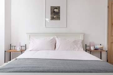 Crisp linens await you, stretch out and relax.