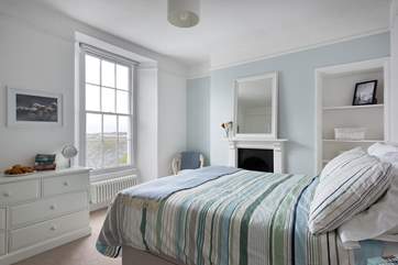 This bedroom is at the back of the house with views up Penryn River.