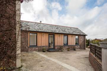 Once you have parked up in your private parking space you walk around the front of The Old Stables where you will find your private garden and entrance.