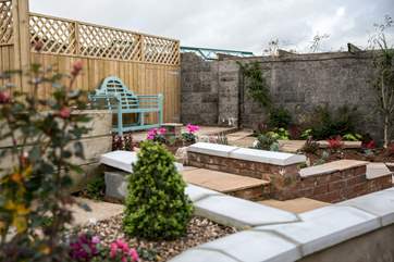 Another private patio-area has been carefully designed to offer you a choice as to where you sit to enjoy the view. Personally, it is relaxing on the sun loungers for me!