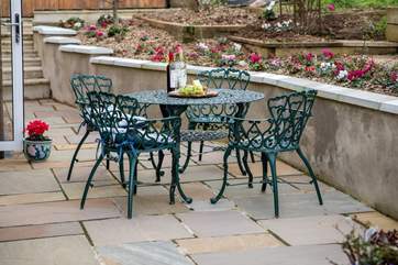 This bistro set is just outside your door and is the perfect place to enjoy a good book in the sunshine.