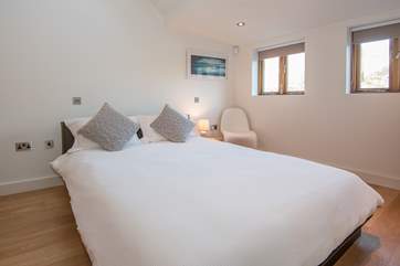 The ground floor bedroom provides privacy from the remaining bedrooms, all of which are located on the first floor...