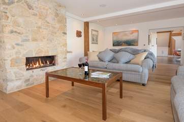 Perfect all year round, you can relax and cosy up during the winter months, or open the doors leading into the garden when the sun is shining
