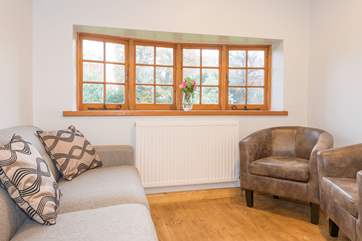 The kitchen area has been carefully designed to make the most of every ounce of space provided, to include a little snug area...