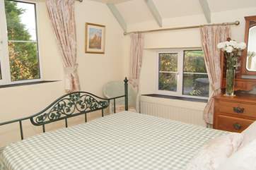 This is the dual aspect main bedroom, (Bedroom 1), which overlooks the front of the house and the apple orchard next door.