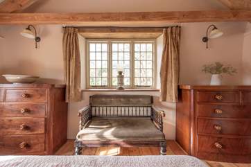 The master bedroom is furnished with antiques.