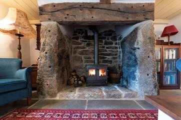 A roaring wood-burner, perfect for cooler evenings.