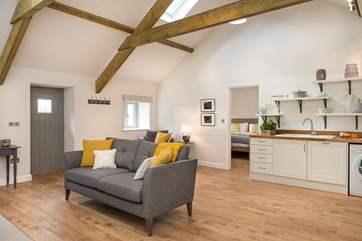The bedroom, leads off from the open plan living-room.