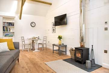 The warming wood-burner makes this an ideal retreat all year round.