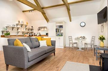 The spacious open plan living-room.