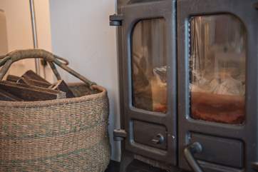 A wood-burner in the sitting-room makes this a perfect place to relax all year round.