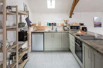 The open plan nature of the property allows you to whip up a feast whilst still enjoying each other's company.