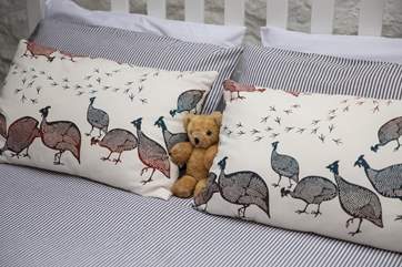 Mr Bear does look rather comfy bless him.