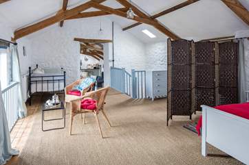 The delightful staircase delivers you into the heart of this beautiful hayloft.