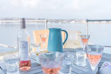 Drinks on the decking while watching the harbour come to life