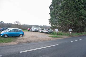 There is parking for one car in this private car park and an additional two spaces, in tandem in the layby just a little further along this road