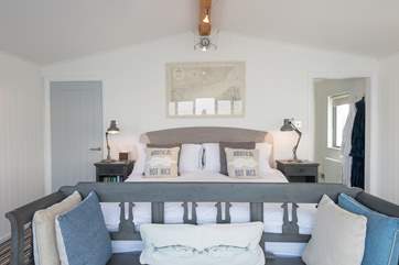 The second bedroom on the first floor is simply stunning, with its own private balcony