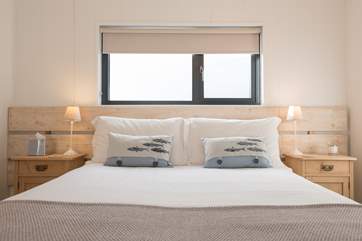 This bedroom also has access to a front facing balcony