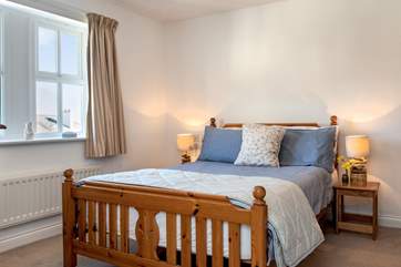 Bedroom 1, with a double bed, enjoys the views of Launceston Castle and majestic Dartmoor beyond.