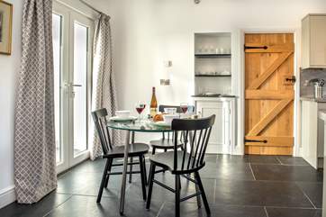 Doors from the dining-area lead out to the patio, and really make the most of the view.