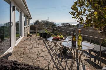 Imagine sitting back with a glass of something tasty enjoying the far-reaching sea views.