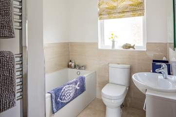The family bathroom is perfect for washing the days sand and sun cream off the little ones, or perhaps a long soak with a good book is more the ticket.