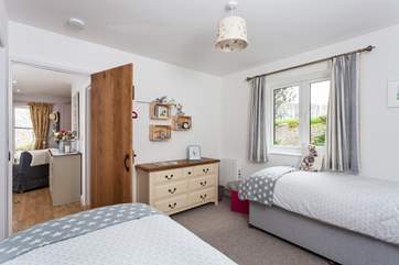 Pretty bedroom two overlooks the fields.