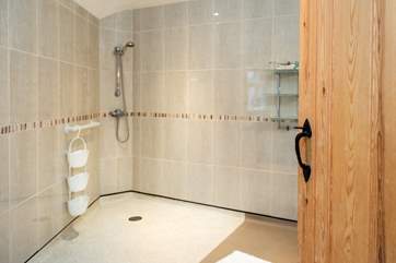 The wet-room is incredibly spacious.