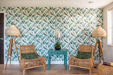 We love the cool colours of this vibrant feature wall.