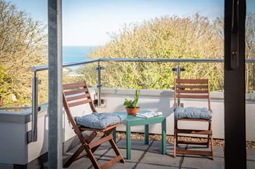 The balcony has far reaching sea views. Sit out here and enjoy a morning coffee.