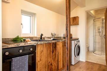 The small kitchen has been thoughtfully designed.