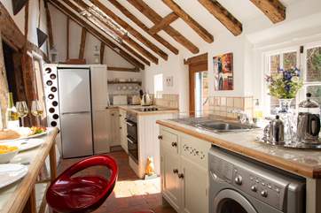 The cottage kitchen is well-equipped.