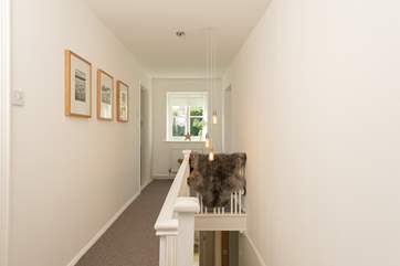 Looking along the length of the landing. The second double bedroom and the twin bedroom are at the far end.