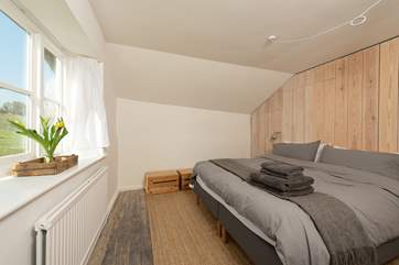 This is the second of the double bedrooms. This room looks out over the garden and up the hill behind the farmhouse.