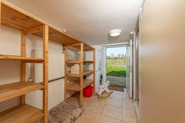 The utility-room on the ground floor has direct access to the garden. This is where the downstairs shower and WC are as well.